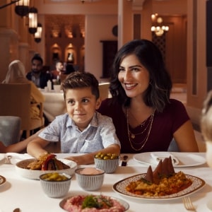 Mother and Child eating in Abu Dhabi