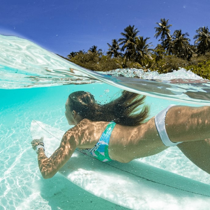 Surfing in the Maldives, Indian Ocean