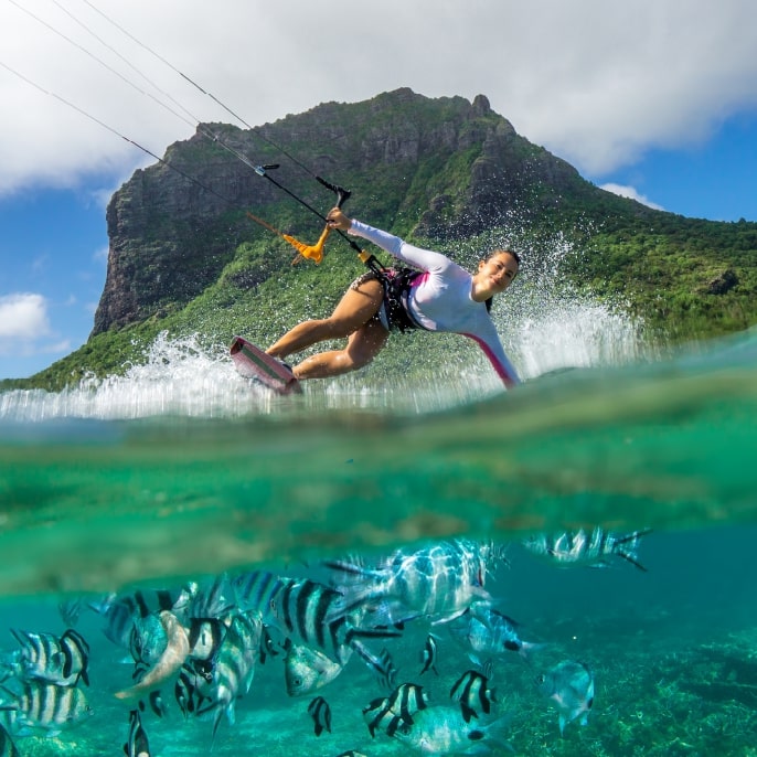 Woman water skiing in the crystal clear Mauritius waters